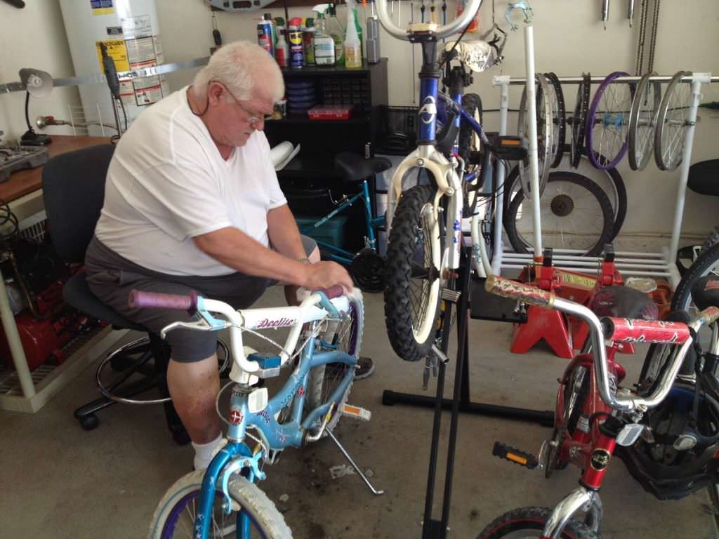 Bob repairing a bike