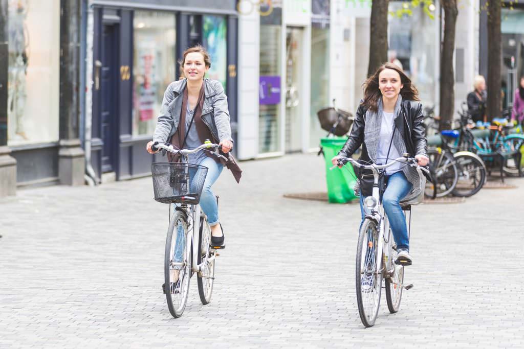 Two cyclists and no cars around