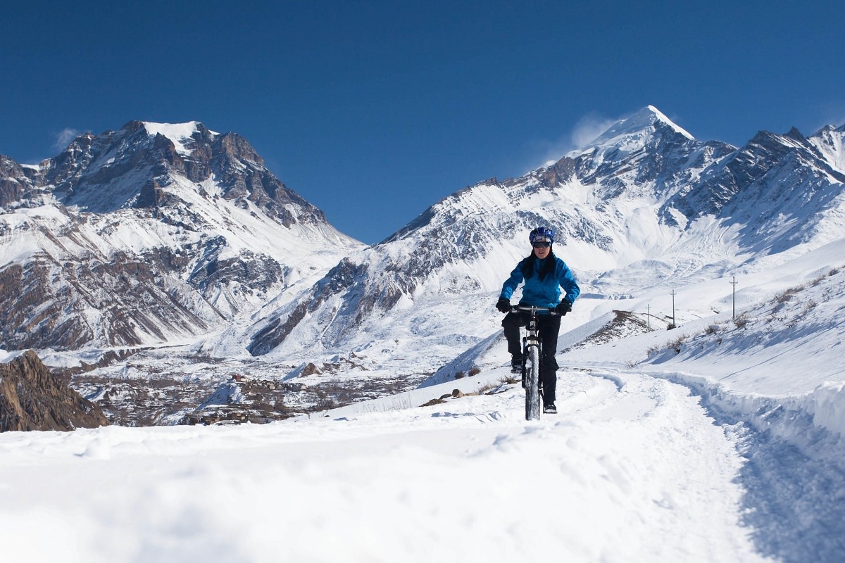 Biking through fresh snow