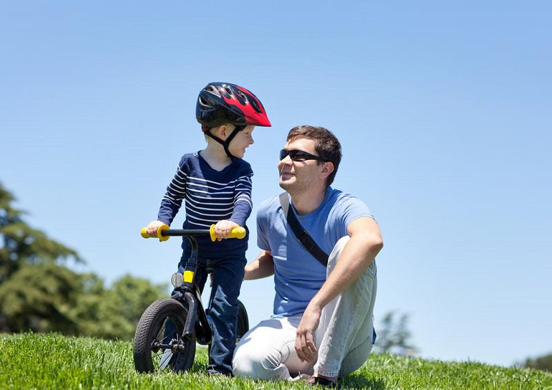 Father and son biking