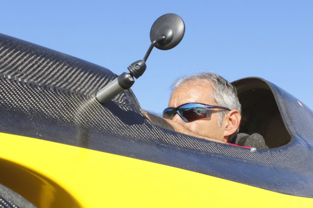 Man in a velomobile