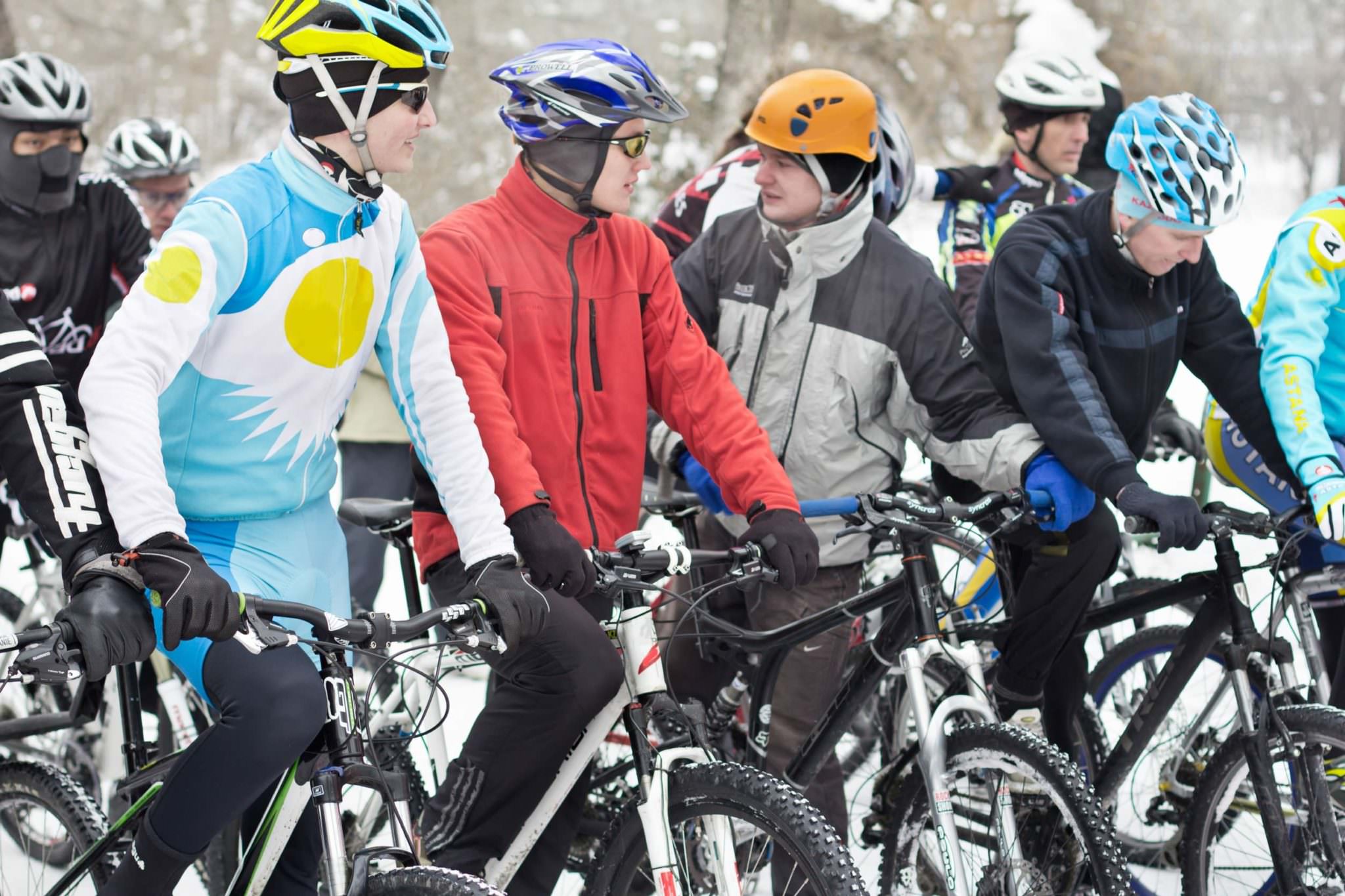 Winter cyclists with different cycling jackets