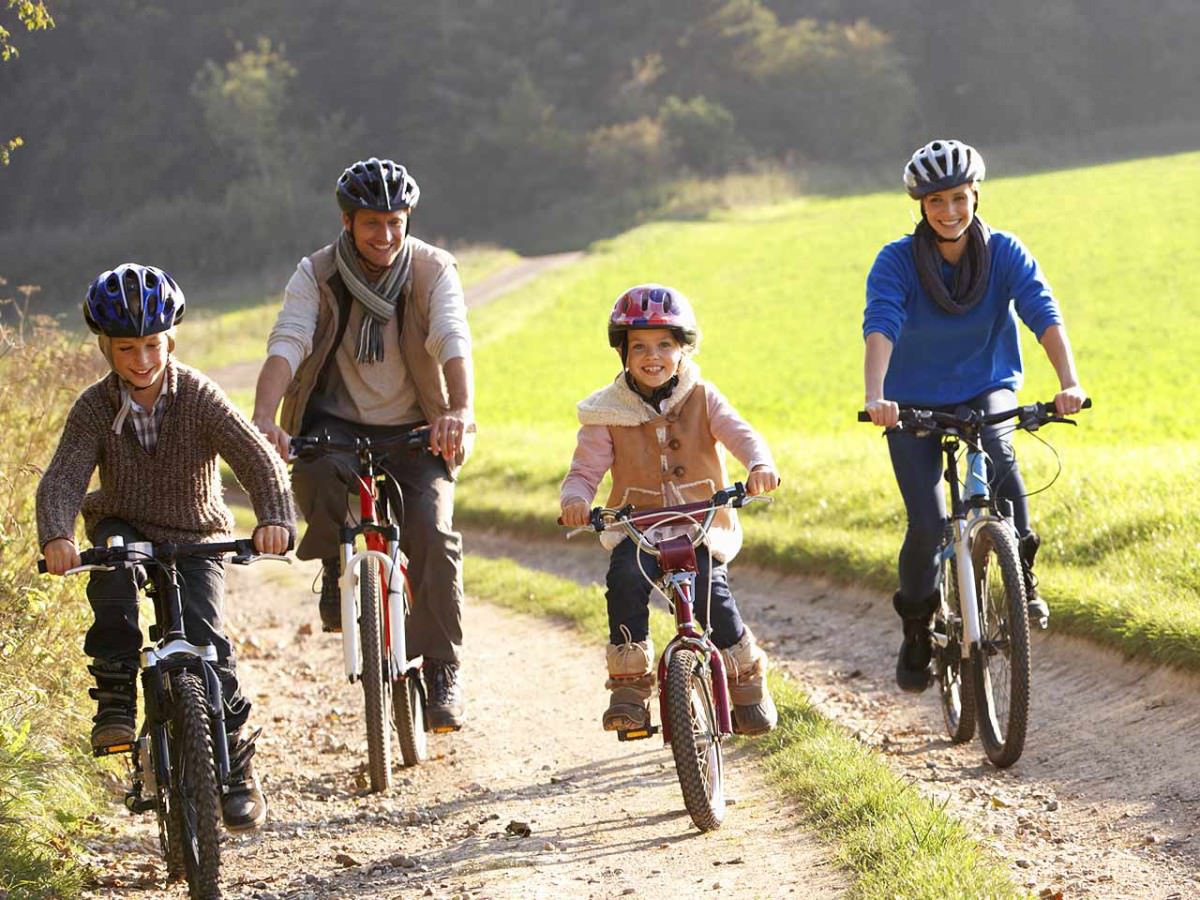 Family riding bikes together