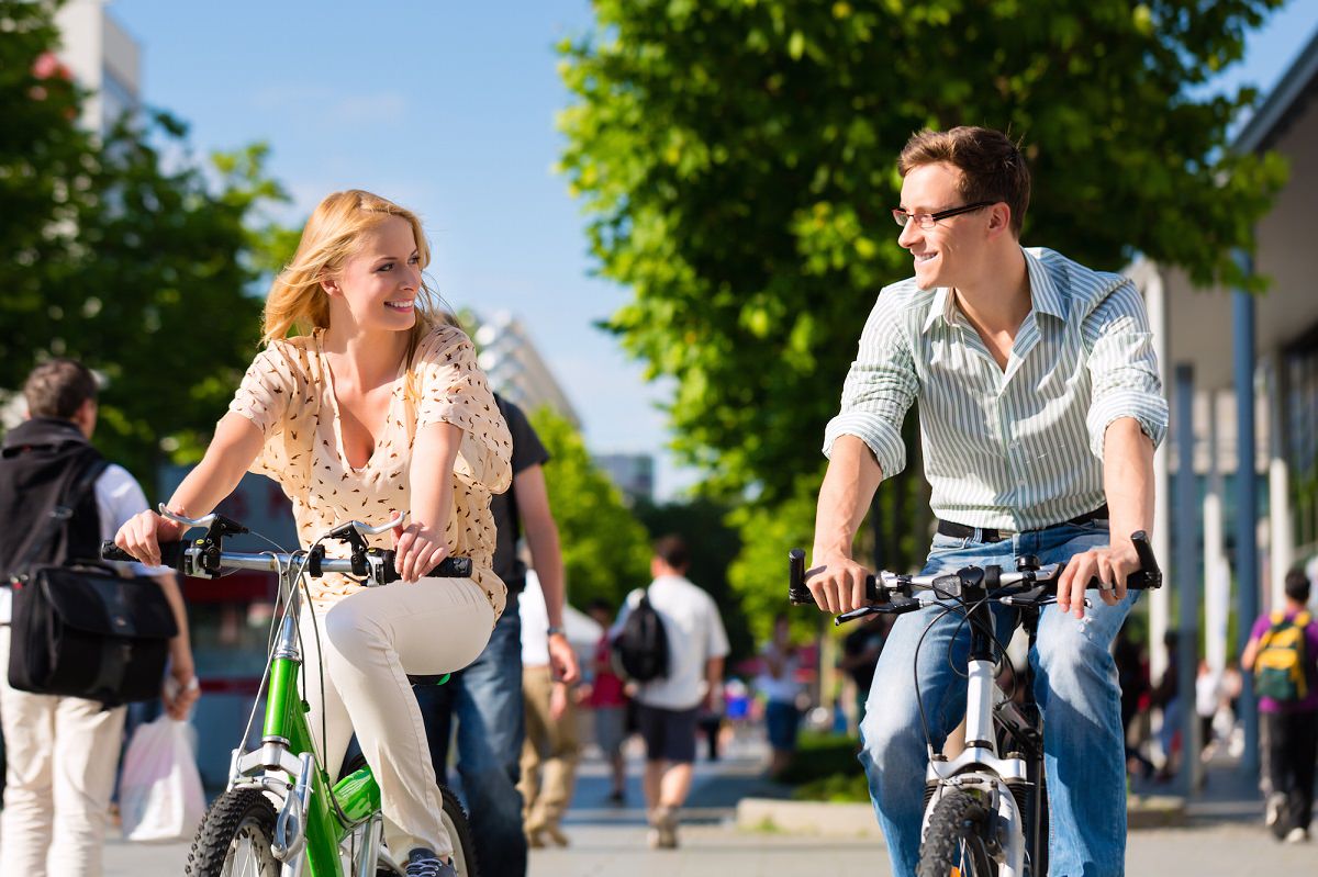 Couple riding together in the summer