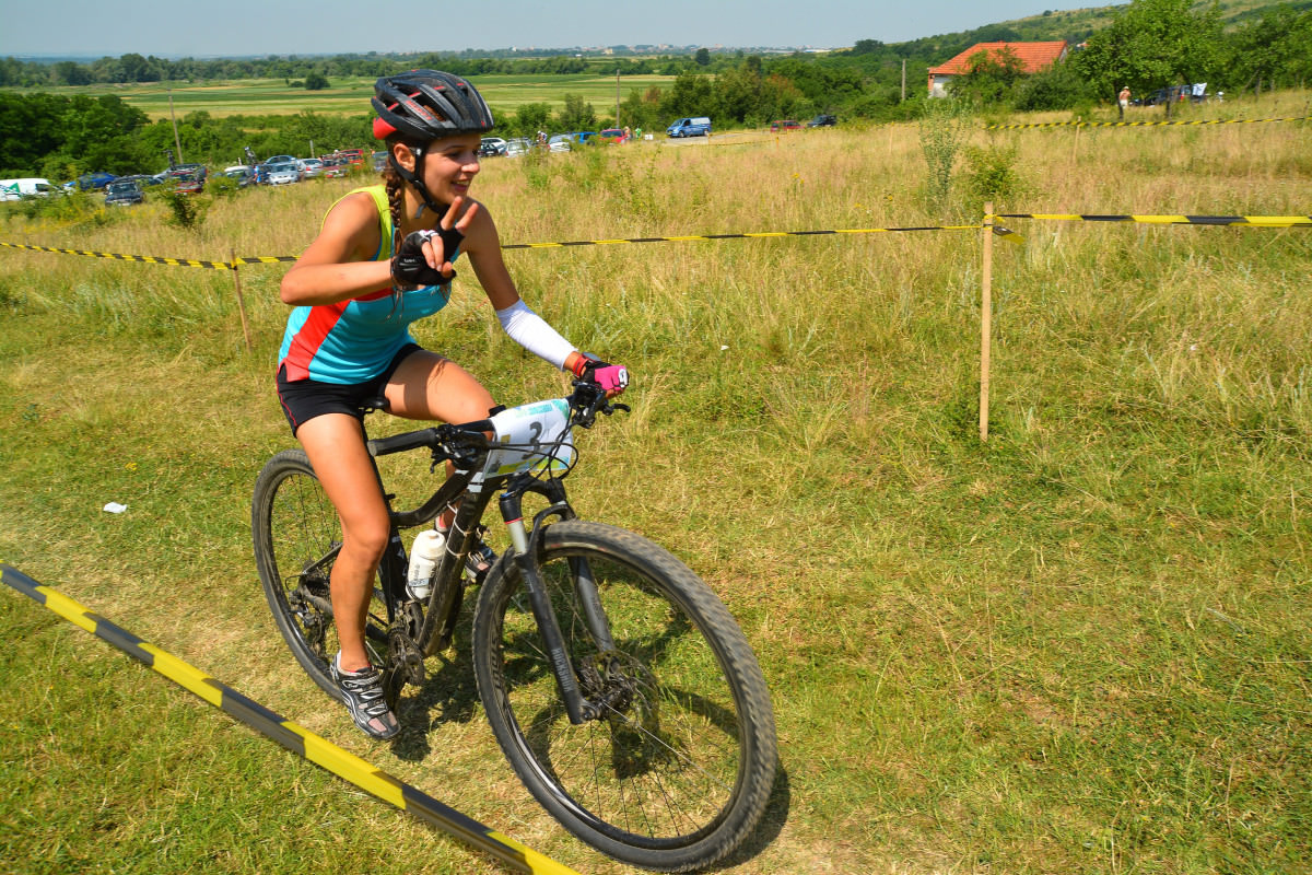 A girl riding a mountain bike