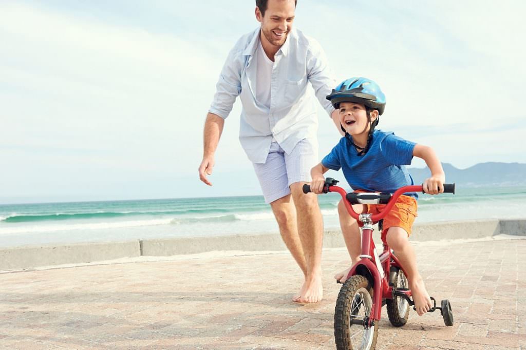 Father and son biking