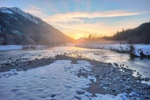 Sunshine on icy river