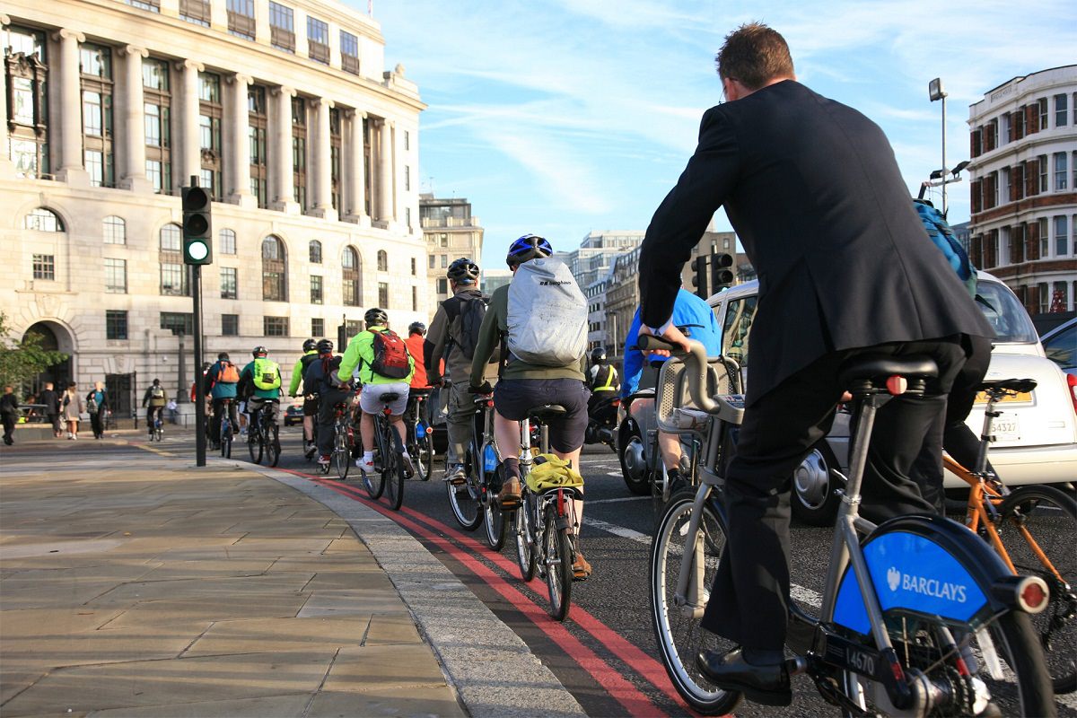 Bicycle riders commuting to office