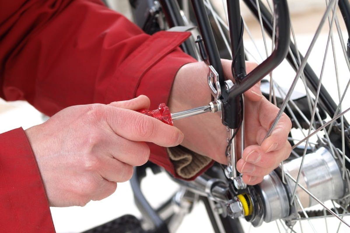 Man repairing a bicycle