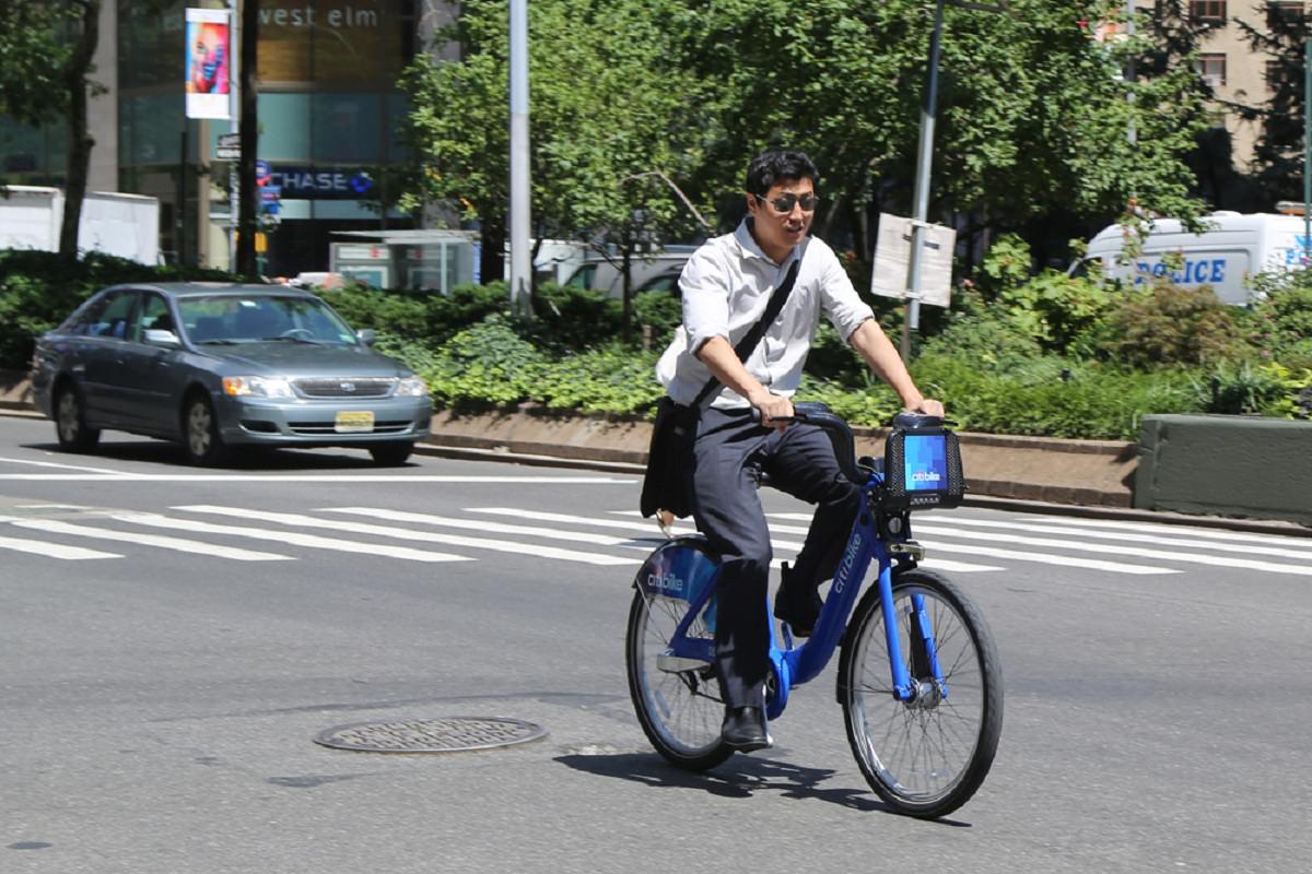 Citi bike rider cycling on road