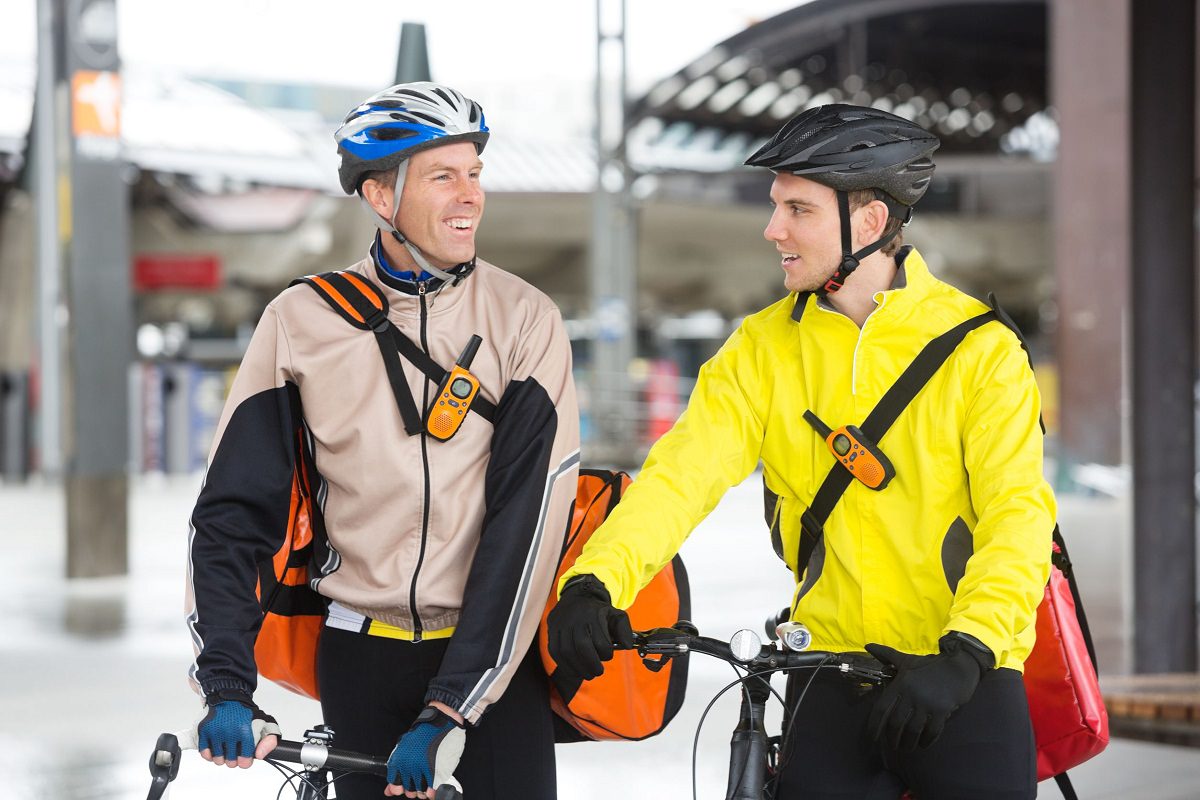 Courier delivery men with their bikes