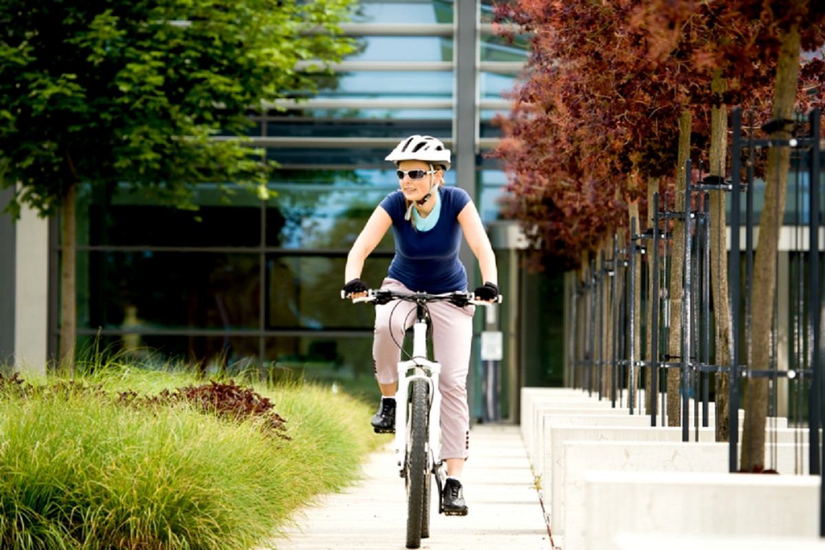 Woman cycling on her bike