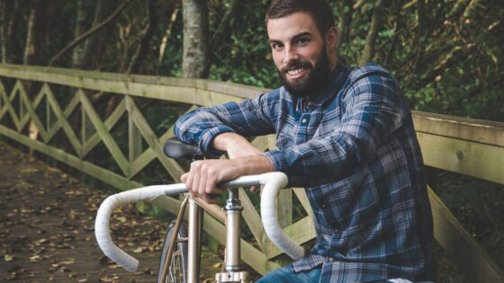 Man with a Fixie bike in park