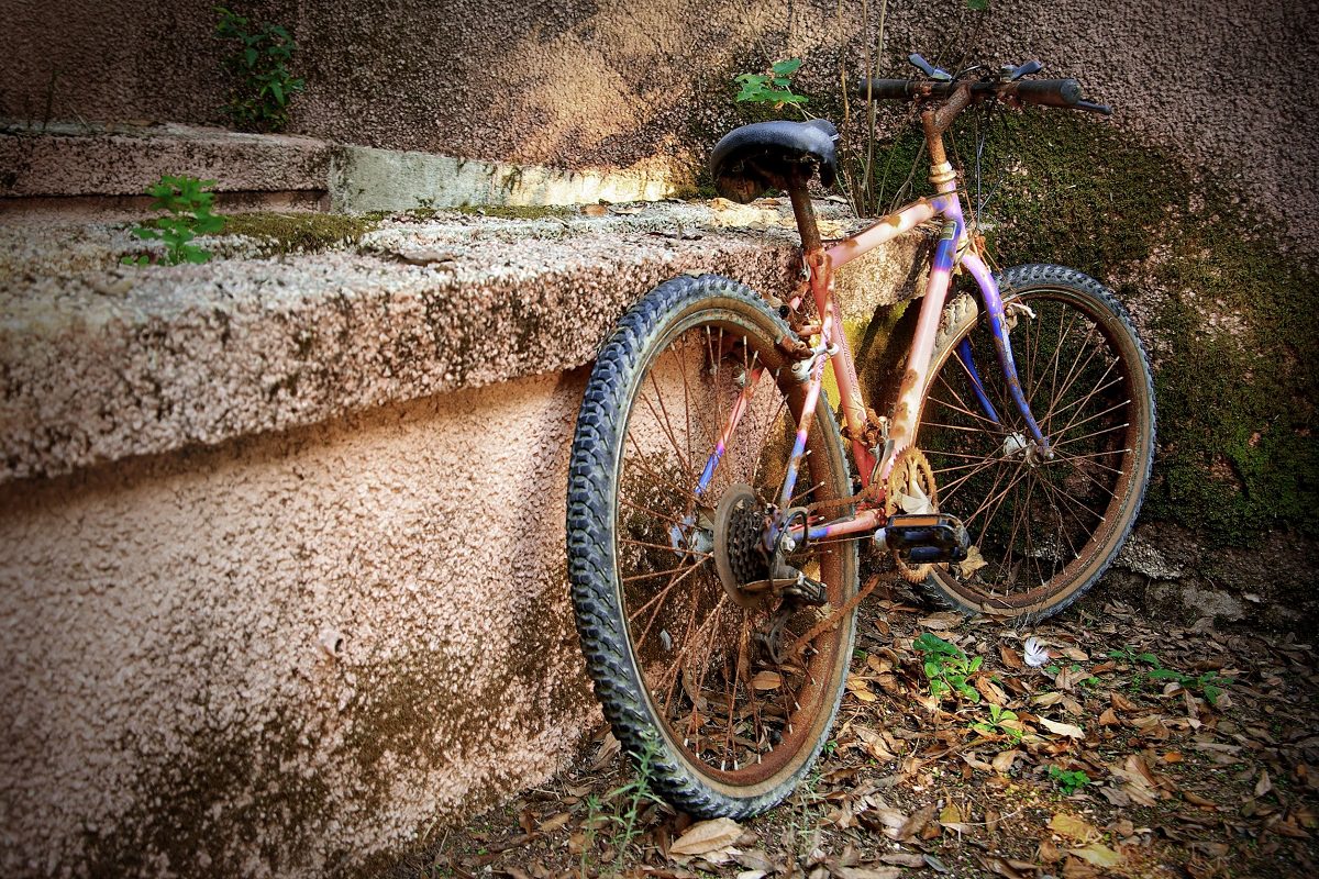 Old rusted bicycle parked