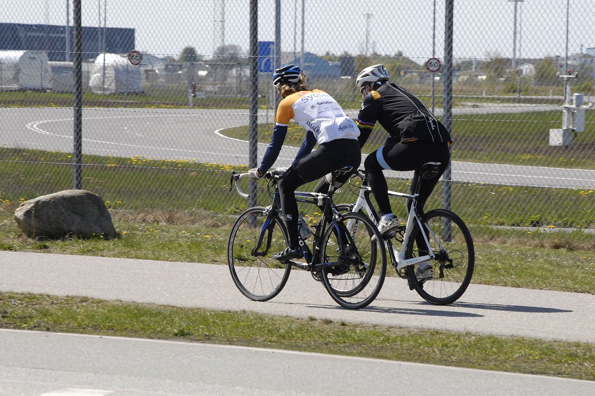 Cyclists riding their bikes together