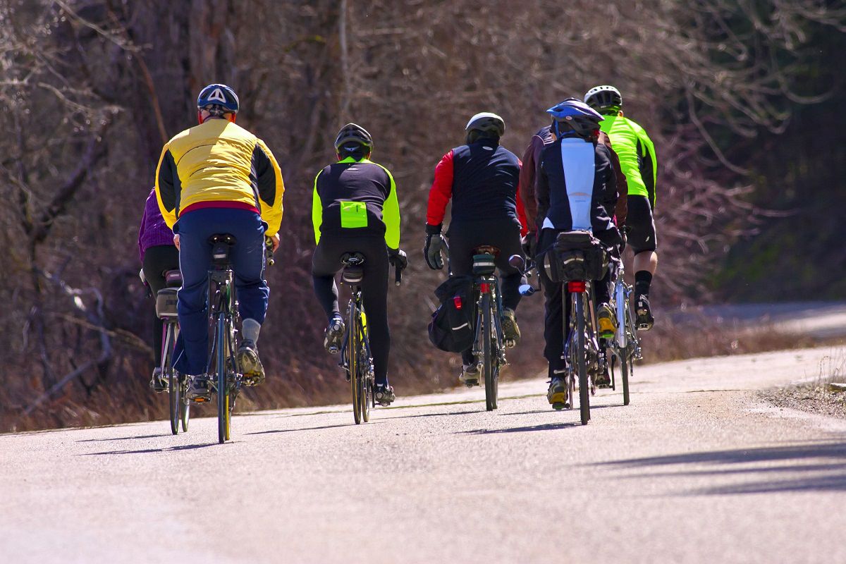 Riders cycling together