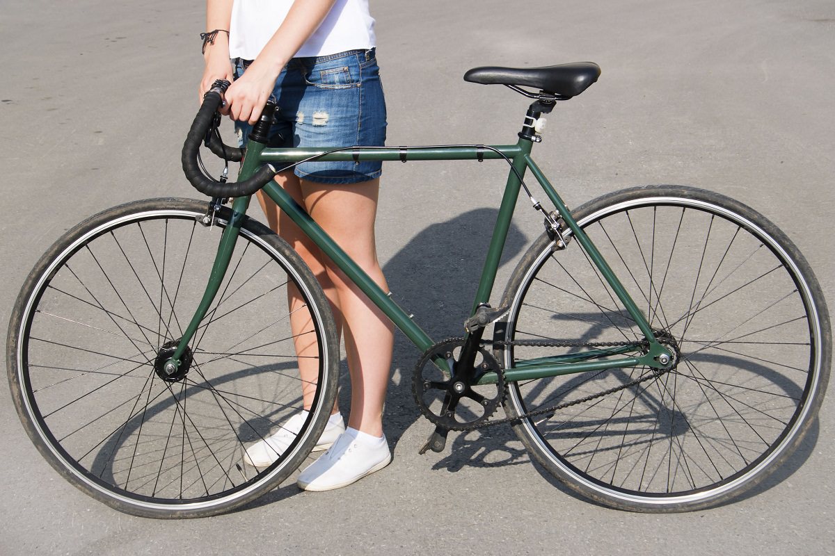 Rider with sports bicycle