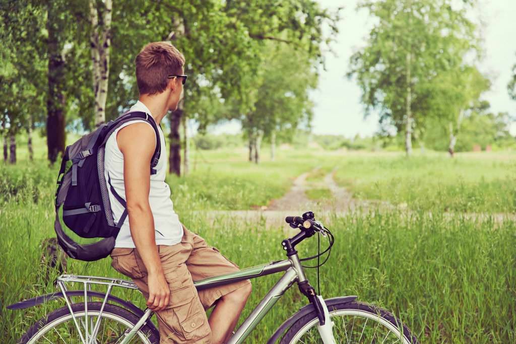 Man on a hybrid bike