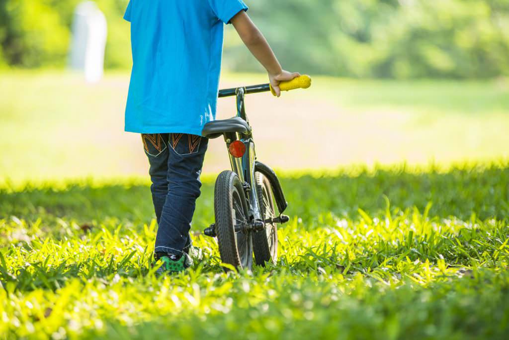 Toddler with his balance bike