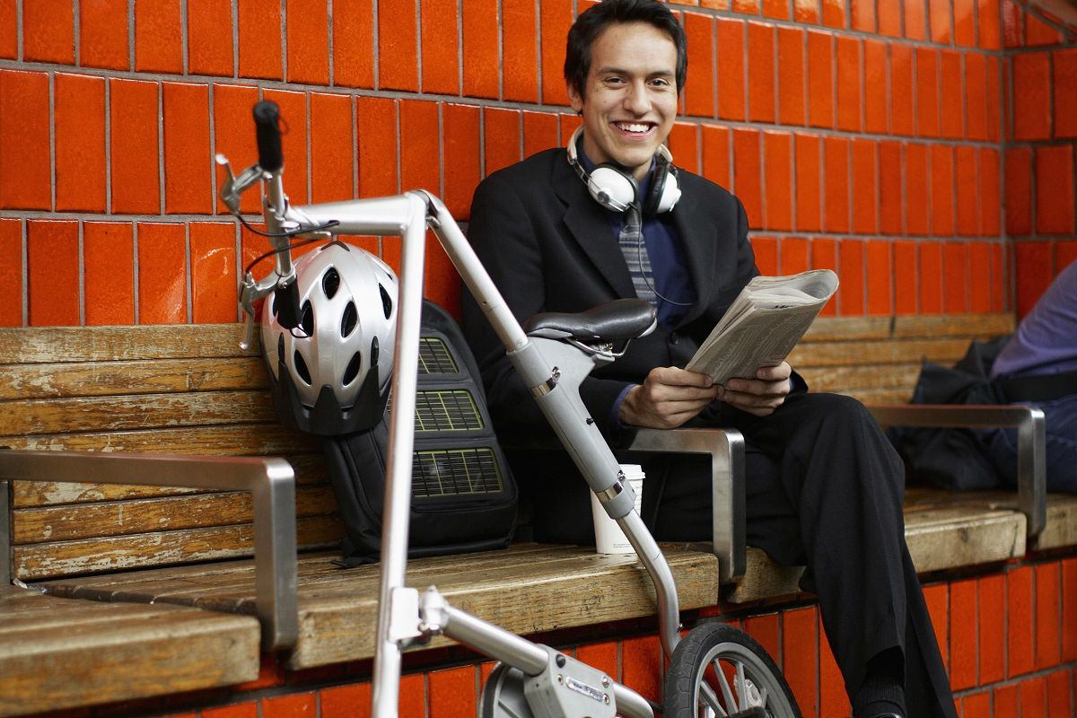 Man with a folding bike