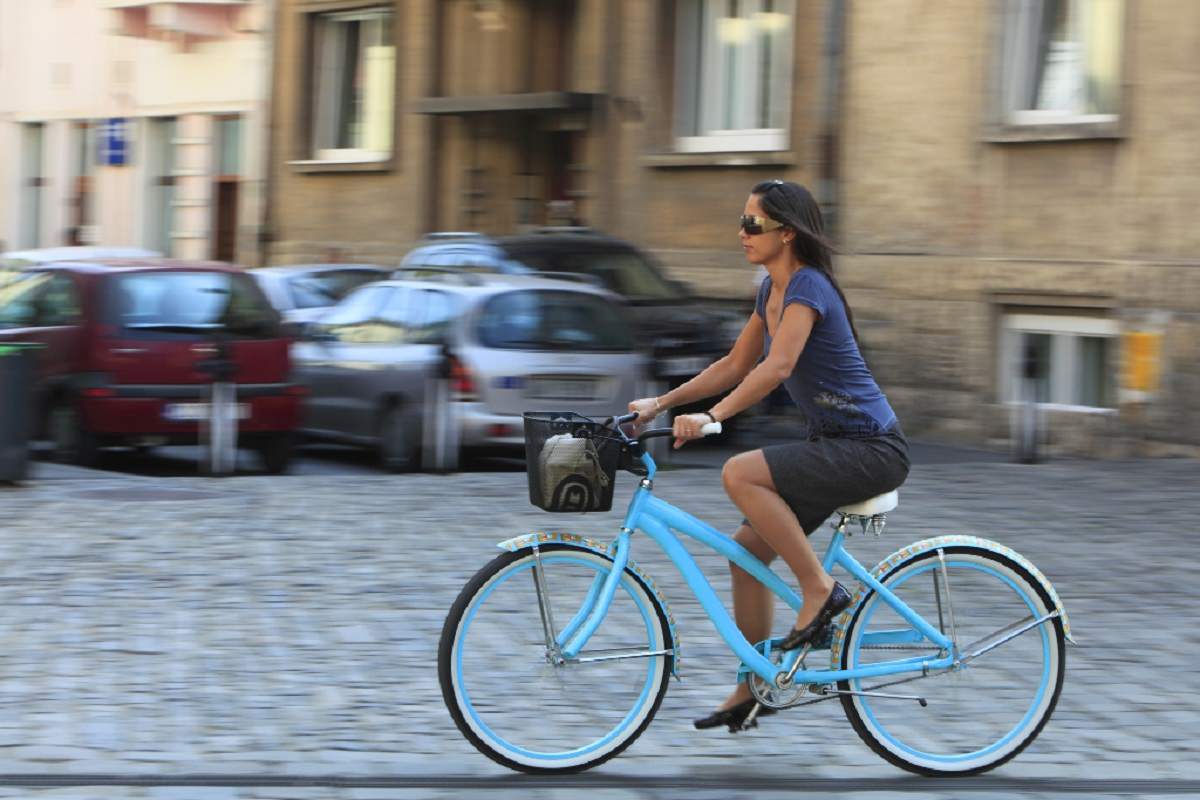 Woman cycling in the city
