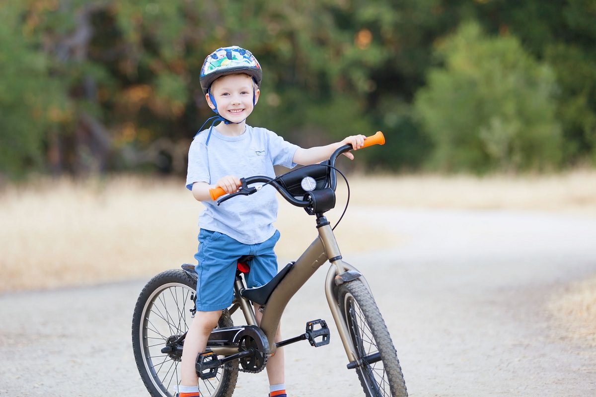 Kid with a mountain bike