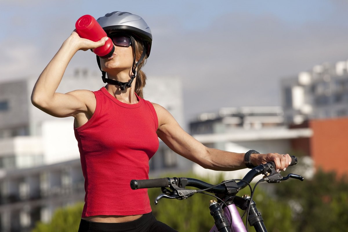 Cyclist drinking water