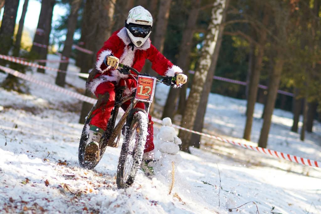 Santa Claus on a mountain bike