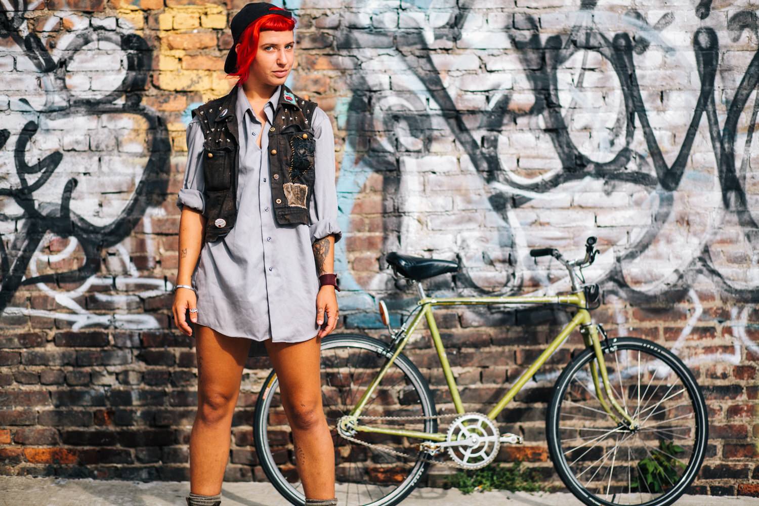 Red haired woman with bike