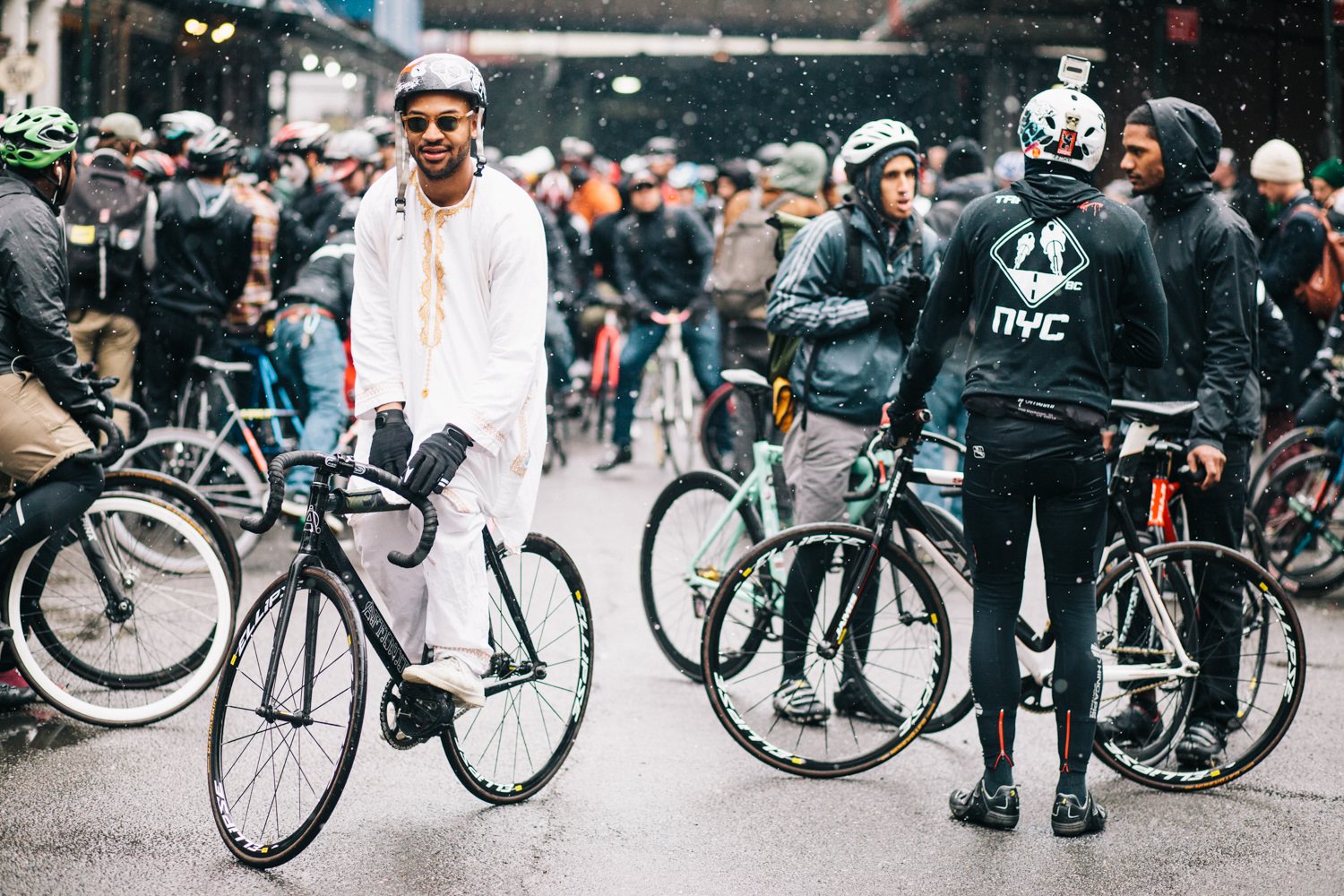 Group of cyclists in the rain