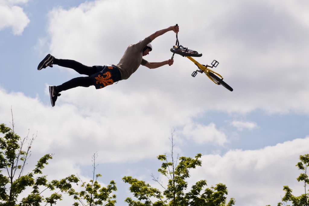 Man flying with his BMX bike
