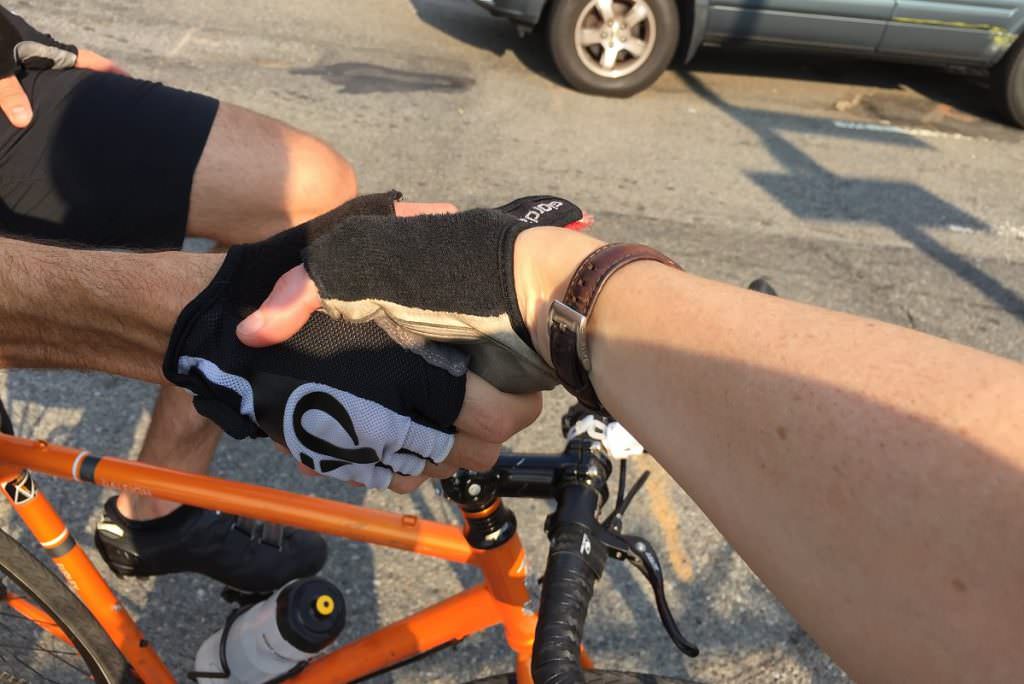 Cyclist handshake