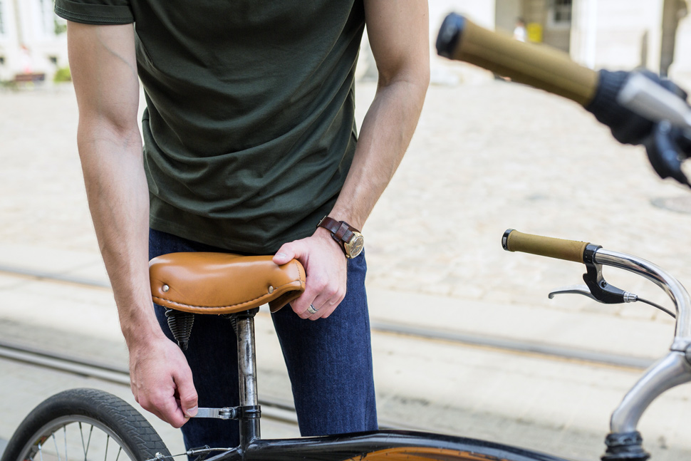 Man adjusting bicycle