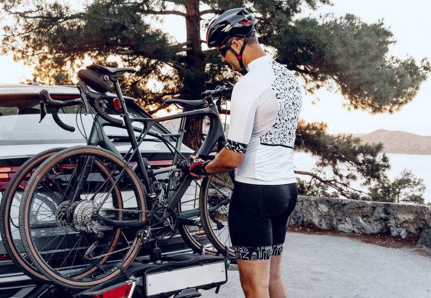 Cyclist Loading His Bicycle On A Rack