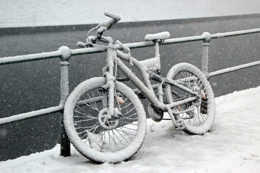 Bicycle Covered In Snow