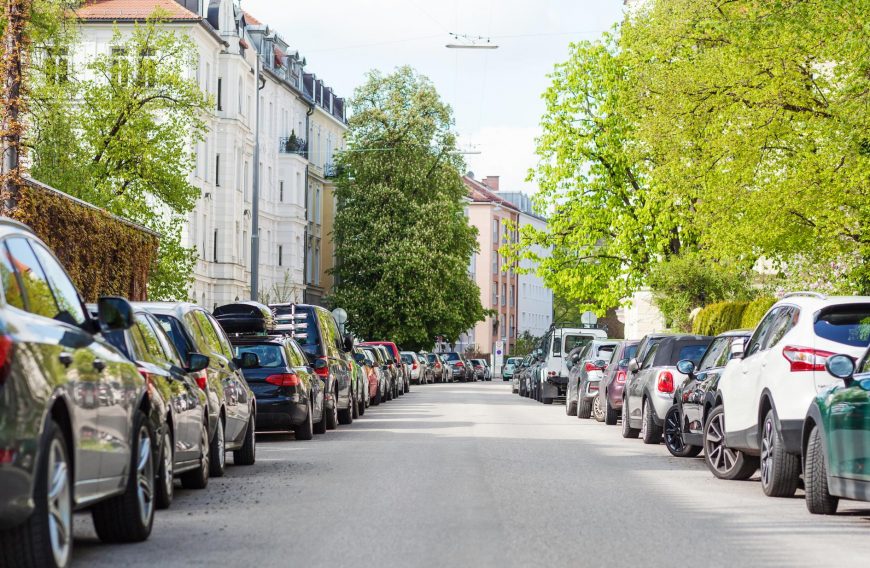 Cars Parking On Both Sides Of Road