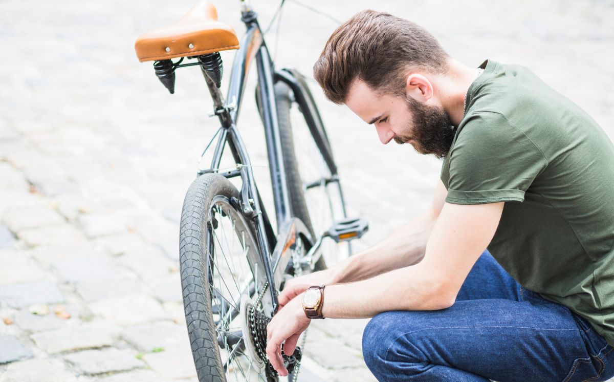 Bicycle Woes Cyclist Fixing The Bike