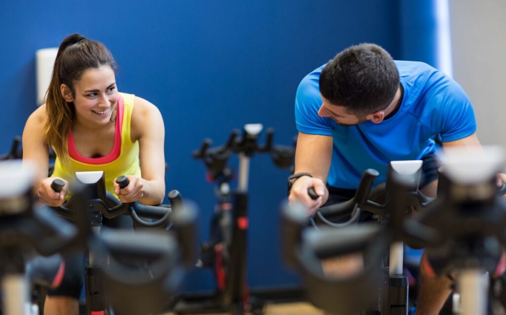 Couple Riding Indoor Bike Trainer