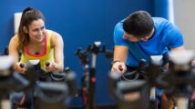 Couple Riding Indoor Bike Trainer
