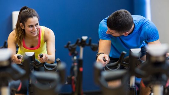 Couple Riding Indoor Bike Trainer