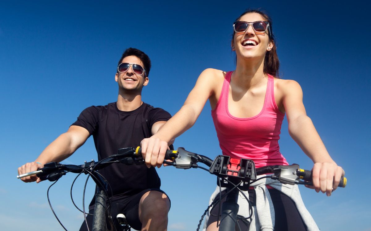 Happy Couple Enjoying Bike Riding