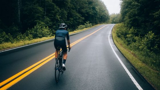 Cyclist Man Riding A Bike On The Road