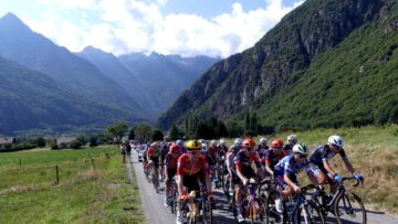 Women's road race peloton climbing through mountains