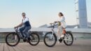 Two riders on ENGWE electric bikes in an urban setting