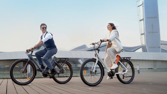 Two riders on ENGWE electric bikes in an urban setting