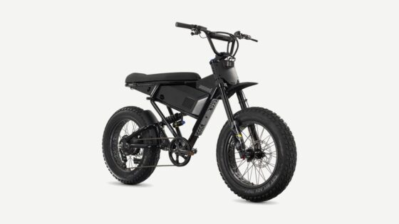 Black Juiced Scrambler electric bike on a neutral background