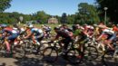Women's road race peloton on a paved course